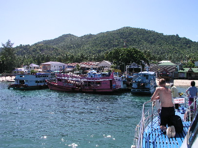 Koh Tao pier with a few dive boats