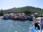 Koh Tao pier with a few dive boats